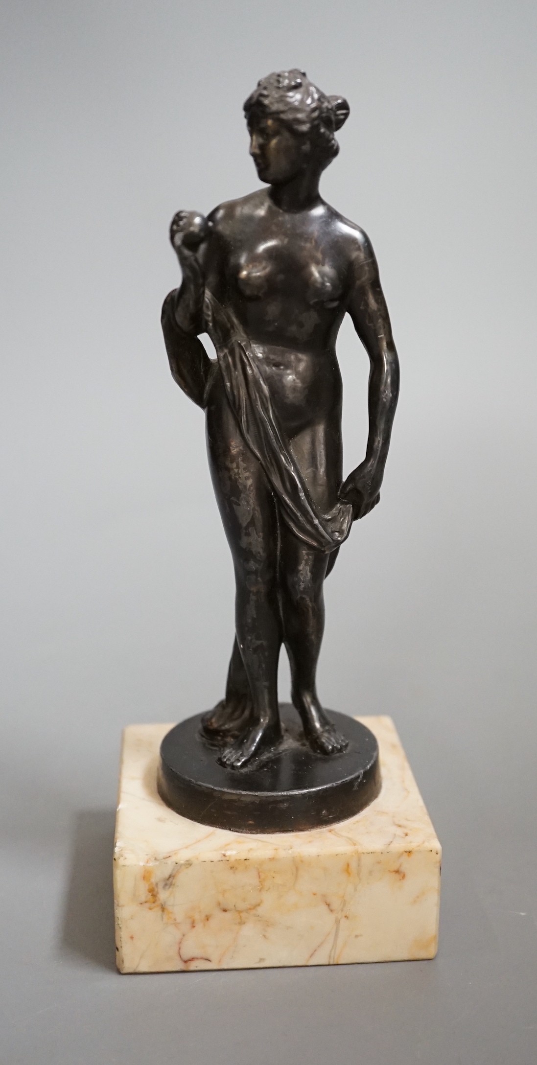 A bronzed spelter figure 'Eve', 20cm high